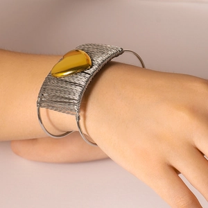 Two-tone heart cuff bracelet with minimalist gold and silver wire wrap design