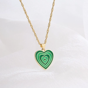 Elegant 18K gold plated necklace with green enamel heart pendant on a twisted rope chain