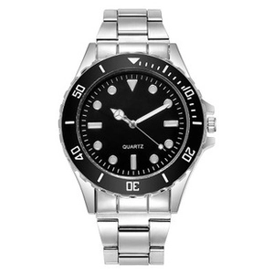Close-up of luminous hands and black rotating bezel on men's quartz sports watch