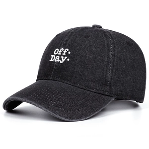 Vintage black washed denim baseball cap with Off Day white embroidery on a plain white background