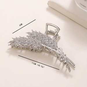 Detailed view of silver wheat ear hair claw clip with rhinestones, 11cm length size info
