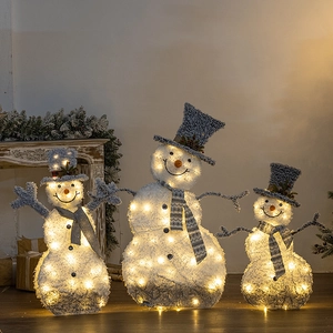 Three-piece glowing Christmas snowman set with warm LED lights and grey plaid scarves
