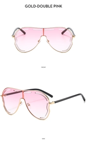 Vue de face et de côté de lunettes de soleil dorées avec verres roses dégradés