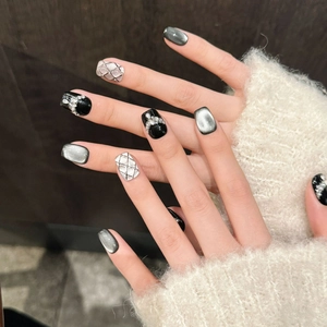 Handmade press-on nails with black cat eye effect, pearls and diamond lattice design