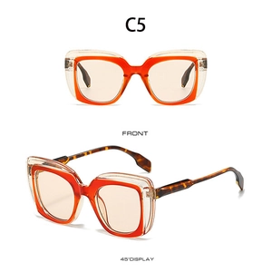 Nahaufnahme der C5 quadratischen Sonnenbrille mit klarem Rahmen und oranger Innenschicht
