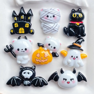Collection of eight cute Halloween resin charms featuring ghosts, black cats, and pumpkins