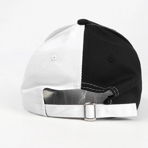 Fashionable black and white split baseball cap with adjustable back strap and metal buckle