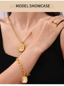 Model wearing gold geometric jewelry set with square rhinestones and chain details