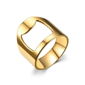 Close-up of golden stainless steel bottle opener ring with a polished metallic finish