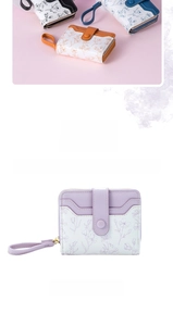 Floral print leather wallet for women featuring secure snap button and wristlet strap