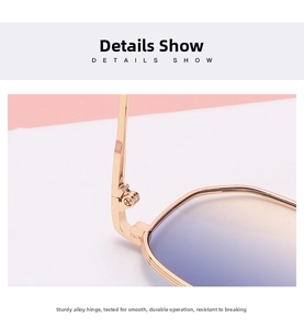 Detailed macro view of the sturdy gold alloy hinge and purple gradient lens on sunglasses