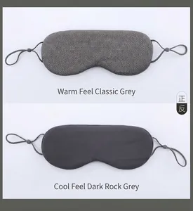 Dual-sided sleep mask detail showing breathable warm knit and cooling silk textures