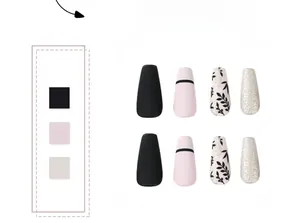 Detail of matte black and pink press-on nails with leaf patterns and silver glitter accents