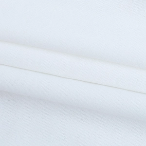 Detailed close-up of white knitted fabric texture showing soft multi-layered folding