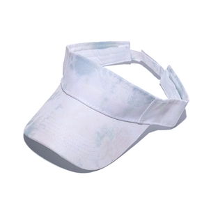 Detailed view of white and blue tie-dye sport sun visor with adjustable strap