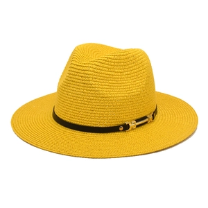 Bright yellow wide brim straw fedora hat with black band and gold buckle for sun protection
