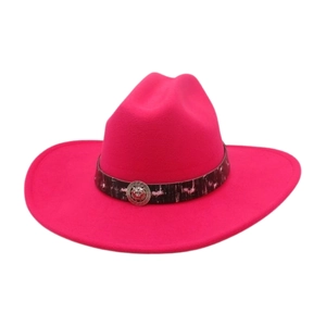 Detail of rose red felt cowboy hat featuring a silver lion head metal buckle trim
