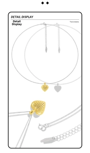 Detail view of gold heart pendant with radial stripes and S925 sterling silver chain