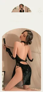 Detail of velvet cheongsam dress with lace trim and elegant halter neck design