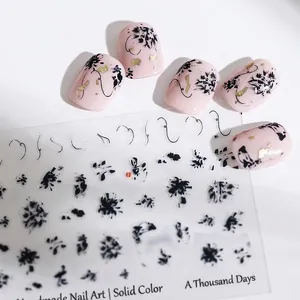 Ink style floral nail stickers with gold glitter and elegant Chinese calligraphy art