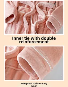 Detailed view of dust-proof cuffs and inner ties on a plush lotus pink flannel bathrobe