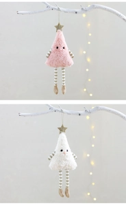 Detail of plush Christmas tree ornaments in pink and white with festive hanging legs