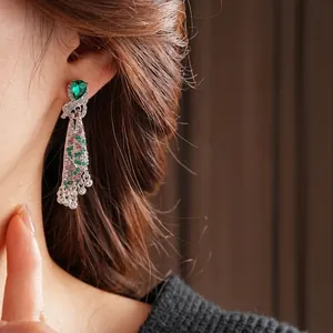 Vintage water drop earrings with green pear-cut stones and colorful tassel rhinestones