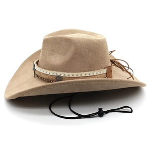 Detail of beige suede cowboy hat featuring star leather band and adjustable chin strap
