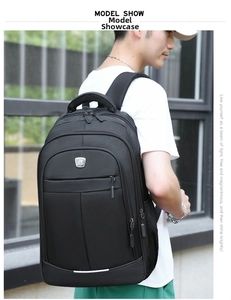Detail of black multi-pocket laptop backpack with reflective strip and JR SPORT logo