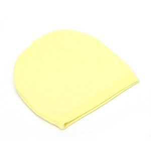 Detailed close-up of light yellow knit beanie featuring a ribbed cuff and fine texture