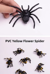 Detailed PVC mock-up spiders showing large black and small yellow-striped toy models