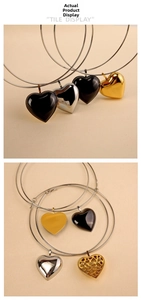 Detailed tile display of heart pendant necklaces in black, gold, and silver finishes