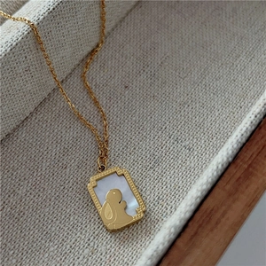 Golden titanium steel necklace with white mother of pearl rabbit pendant in gift box