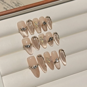 Champagne cat-eye handmade press-on nails with luxury 3D butterfly and rhinestone accents