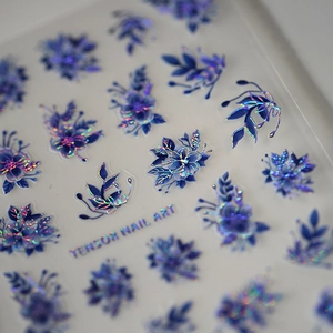 Holographic blue flower nail stickers featuring laser aesthetic and adhesive leaf designs