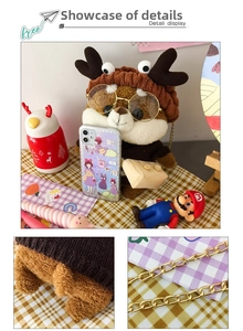 Detail view of Shiba Inu plush bag with reindeer headband, glasses and gold chain strap