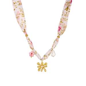 Detail of floral ribbon necklace with matte gold flower and pearl pendant charms