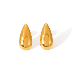 Detailed close-up of high-polish gold teardrop earrings with smooth metallic finish