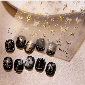 Détails des stickers nail art 3D gaufrés dorés M-510 avec motifs nœuds et ailes