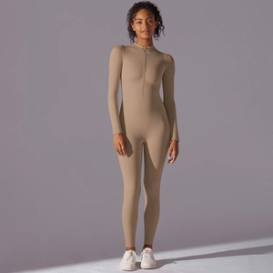 Detail of high-stretch khaki long sleeve yoga bodysuit with half-zip stand collar