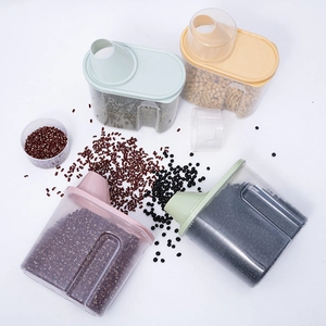 Set of clear plastic cereal storage jars with colorful lids for kitchen grain organization