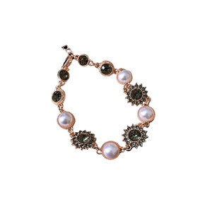 Vintage style rose gold bracelet with artificial pearls and sunburst crystals for women