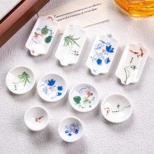 Miniature blue and white porcelain tableware set with traditional Chinese lotus patterns
