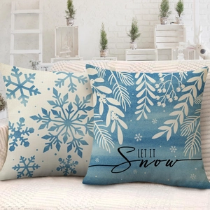 Set of two winter Christmas pillow covers with blue snowflake and Let It Snow print on linen