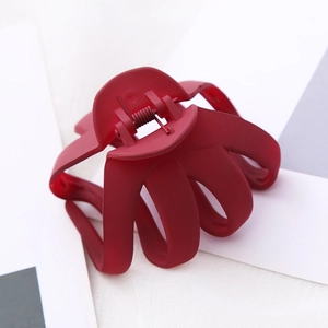Detailed view of 8CM matte burgundy octopus hair claw clip with durable metal spring