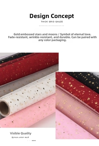 Detail of star and moon gold stamping on floral mesh wrap for bouquet packaging