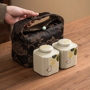 Hand-painted rabbit and osmanthus ceramic tea canister set with fabric carrying bag