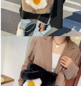 Detail of plush tote bag with poached egg design and gold metal chain strap