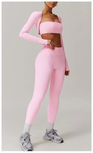 Front view of pink 3-piece yoga set including zip jacket, bra and high waist leggings