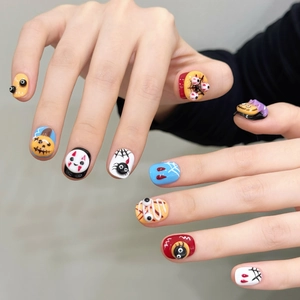 3D Halloween press-on nails featuring embossed pumpkin, skull, and spider web designs